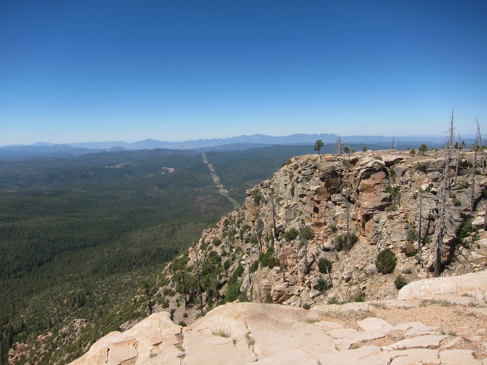 The strip in the middle is cleared land around transmission towers that climbed up over the rim....
